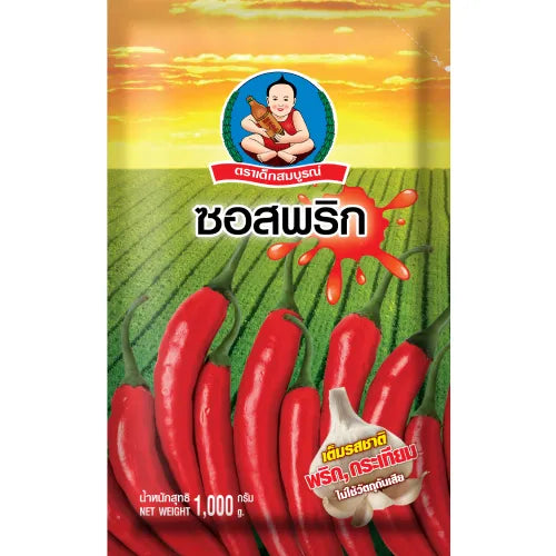 Deksomboon Chili Sauce 1000g bottle, Thai dry grocery product with red chili sauce visible in a clear plastic container.