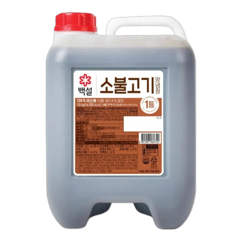 Beksul Bulgogi Sauce 10kg jar, Korean dry grocery product, rich marinade for beef dishes, with label and lid visible.