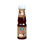 Deksomboon Oyster Sauce Thick 165g jar, a popular dry grocery product with a rich, savory oyster flavor in a glass container.