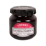 Jar of LA Vieja Fabrica Cherry Mermelada 280g with a label, showcasing the jam's rich cherry preserves in a glass jar.