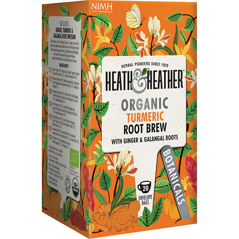 Heath and Heather Turmeric Root Brew organic drink in a glass, showcasing the vibrant yellow color of the turmeric root brew.