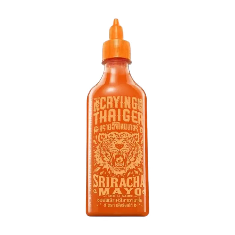 Crying Thaiger Sriracha Mayo Chili Sauce in 493g bottle, spicy Thai condiment with vibrant red color and tiger logo label.