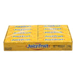 Wrigley's Juicyfruit gum pack with 20 pieces, 13.5g each, showing colorful gum packaging and individual gum pieces.