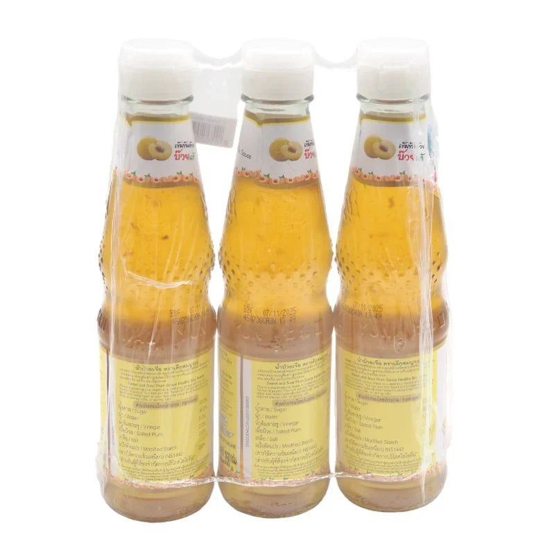 DEK SOM BOON Boon Plum Sauce 350g, three bottles, close-up of the dark, glossy sauce in glass bottles on a white background