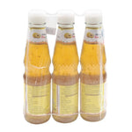DEK SOM BOON Boon Plum Sauce 350g, three bottles, close-up of the dark, glossy sauce in glass bottles on a white background