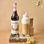 Monin Chocolate Cookies Syrup 700ml bottle, ideal for desserts and beverages, featuring rich chocolate cookie flavor.