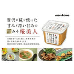 Marukome Plus Koji Miso additive-free dry grocery product in a sealed package, showcasing traditional Japanese miso paste.