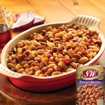 Cans of S&W Pinto Beans in a grocery store, featuring the label with product details and brand logo.