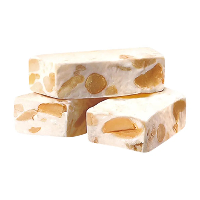 Nezline Nougatto peanut nougat snack with almonds and caramel in a close-up view, showcasing its chewy, nut-filled texture.