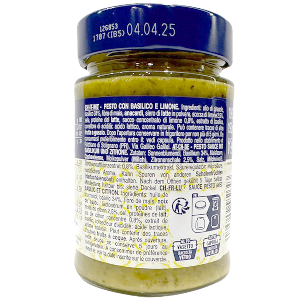 Barilla Pesto Basilico Limone jar with basil leaves and lemon slices, showcasing the Italian pesto condiment.