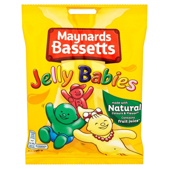 Colorful Bassetts Jelly Babies confectionery snacks in various flavors with a glossy, chewy texture.