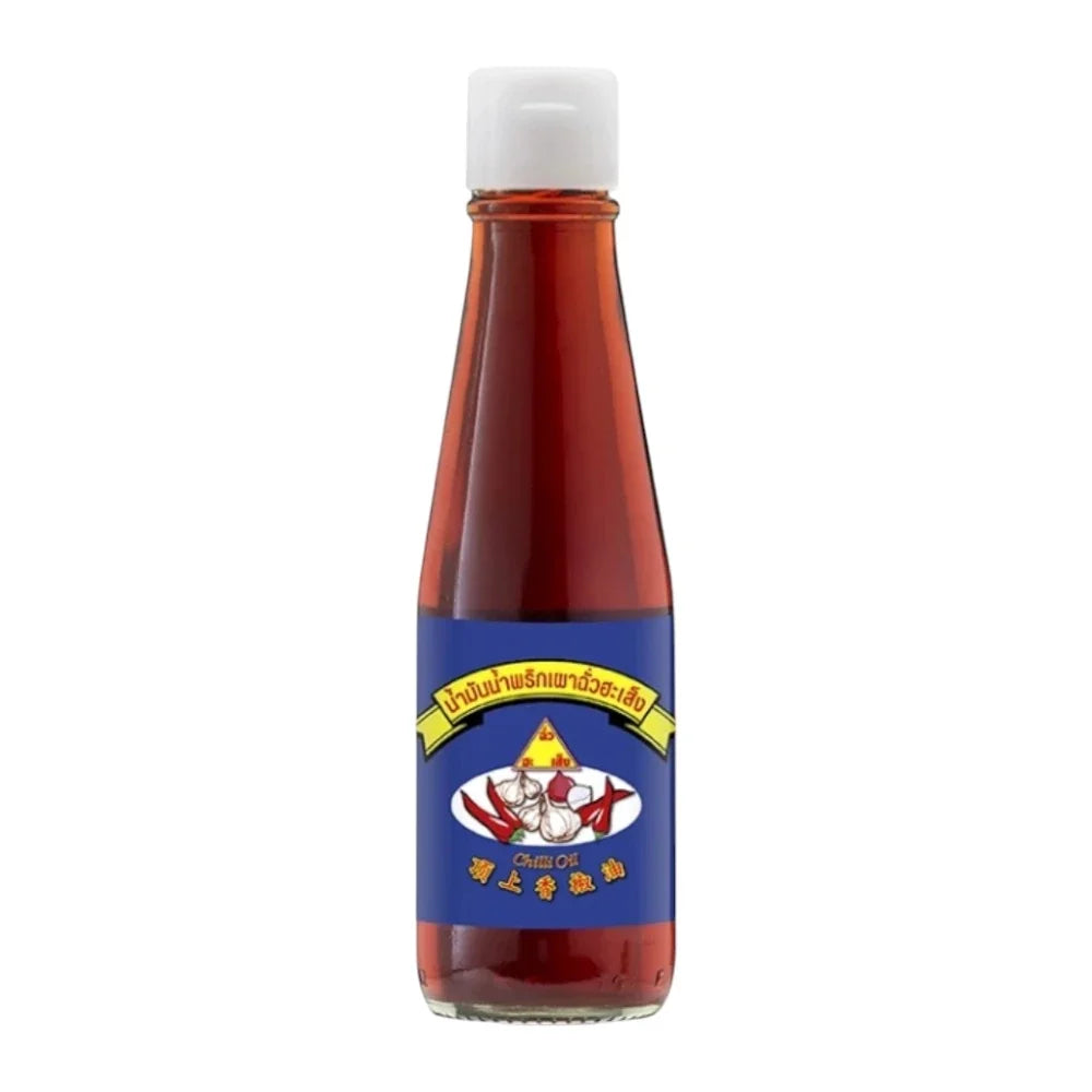 Chua Hah Seng Chilli Paste Oil 190ml bottle with red chili paste, used in dry grocery cooking, on a white background.