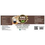 King Organic Japanese soy sauce bottle, dark liquid in a glass container with a label, for use in cooking and seasoning.