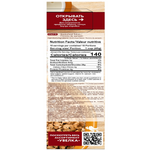 Uvelka Buckwheat Flakes in a clear bowl, showcasing golden-brown toasted buckwheat flakes ready for breakfast or cooking.