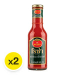 Roza Tomato Ketchup 600g bottles from the dry grocery aisle, featuring bright red ketchup in clear bottles branded by ROZA.