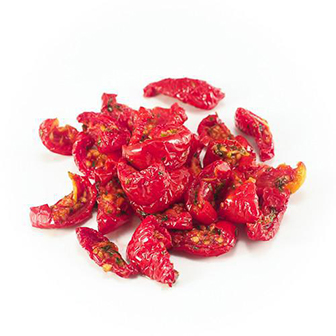 Sp grocery Sundried Tomatoes from Sp brand, close-up of dried, deep red tomatoes in a clear container.