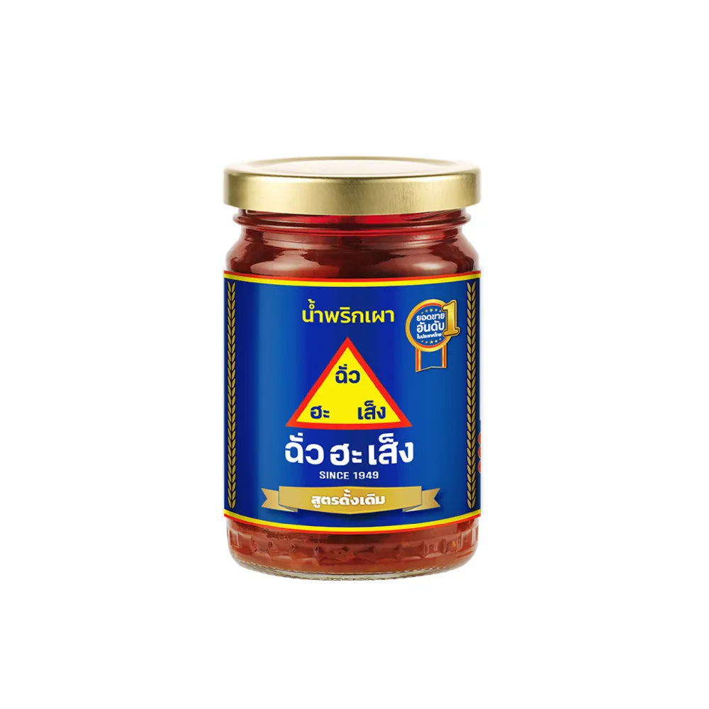 Chua HAH Seng Original Chilli Paste 228g jar, showing red chili paste with textured surface in a clear glass jar.