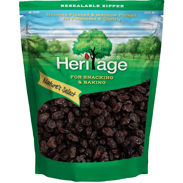 Heritage Black Raisins, chewy confectionery snack with dark, glossy raisins in a clear container, showcasing their rich color and texture.