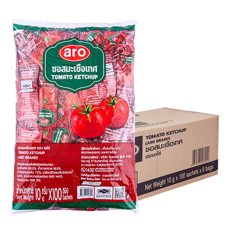 A box of ARO Tomato Sauce 10g packets, dry grocery product with eight individual sachets arranged neatly.