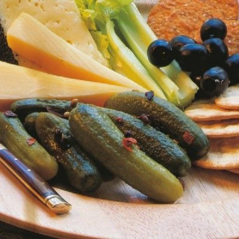 Jar of Fragata whole gherkins in brine, 935g, in a clear glass container showcasing fresh, crunchy pickles.