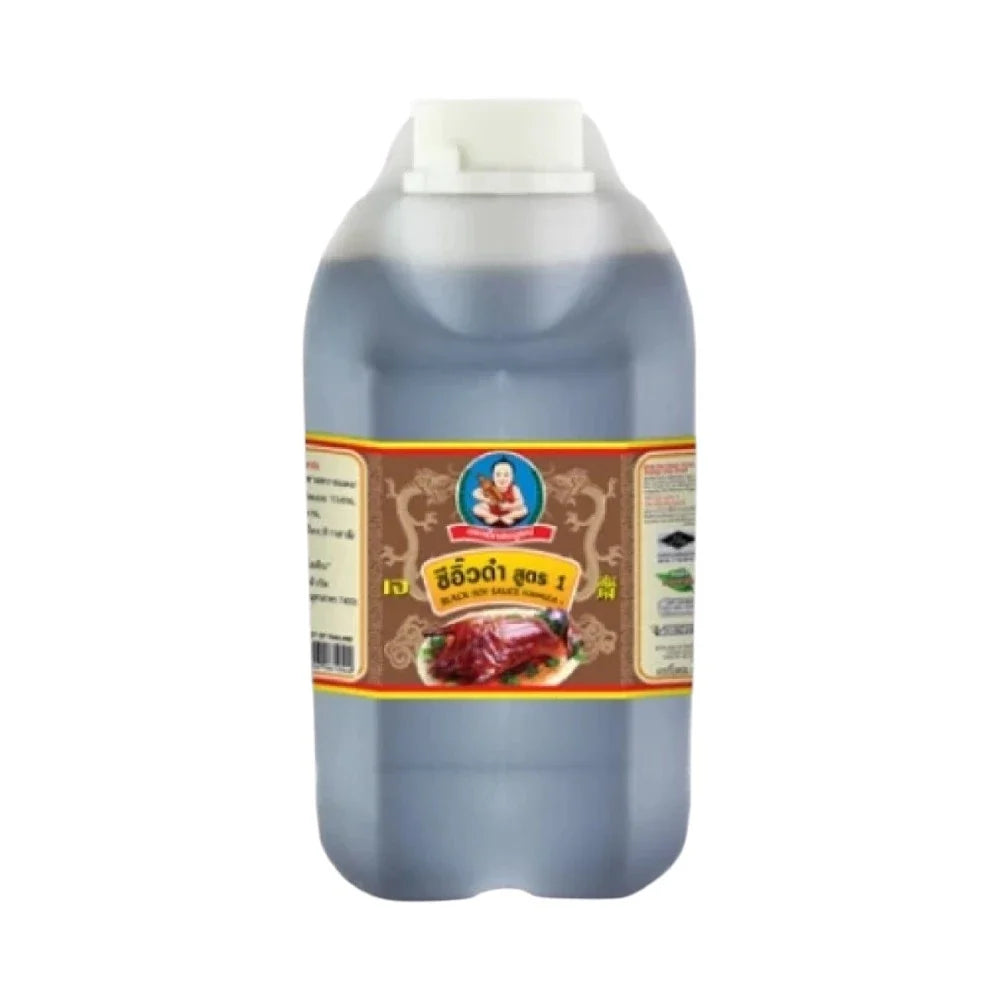 Deksomboon Black Soy Sauce 5kg bottle, a dark liquid used in Asian cuisine, shown in a clear plastic container.