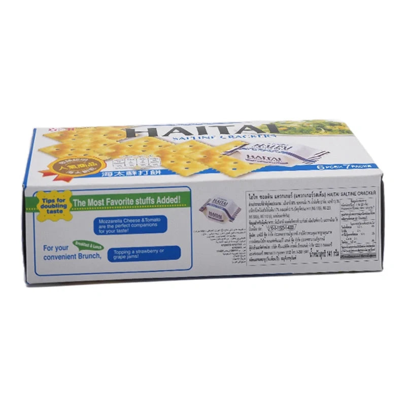 Haitai Saltine Crackers 141g in a clear package, showing crispy, square saltine crackers from the dry grocery snack selection.