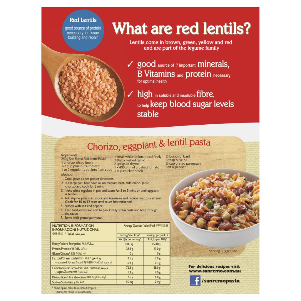 San Remo Red Lentils Spirals, uncooked pasta made from red lentils, in a clear bowl showing the vibrant red color and spiral shape.