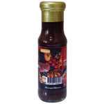 Jadjans Mala Sauce jar showing the label with spicy sauce inside, ideal for adding flavor to various dishes.