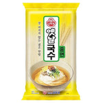 Ottogi Otoki Korean wheat noodles in 900g package, round dry pasta with a smooth surface, ideal for Asian noodle dishes.
