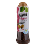 Kewpie Balsamic Dressing bottle with label, used for salads and dishes, on a white background.