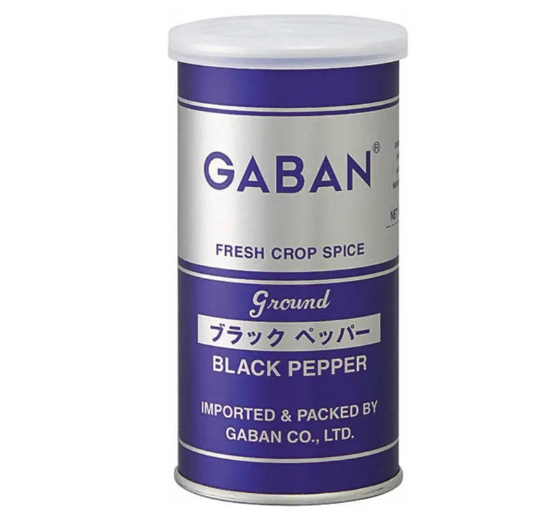 GABAN Ground Black Pepper in a jar, close-up of the dark, finely ground spice for culinary use in dry grocery products.