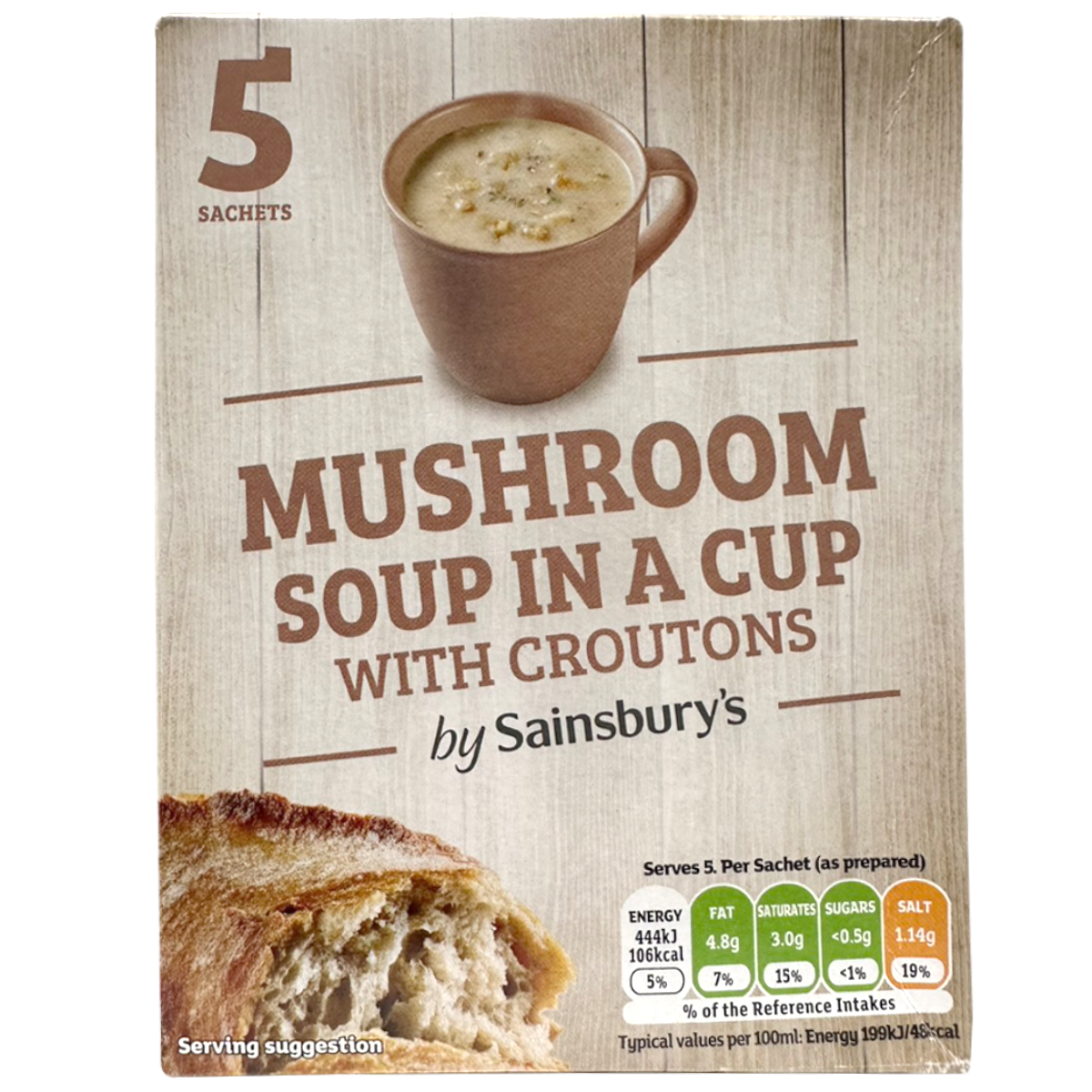 Sainsbury's mushroom soup in a cup with croutons, ready to eat, served in a white cup with soup and crispy croutons on top.