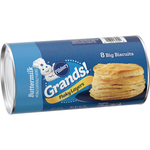 Pillsbury Grand Buttermilk Biscuit, soft and flaky confectionery snack served warm with butter on a plate.