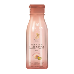 Squid Premium Fish Sauce first extract with Himalayan salt in a clear glass bottle, showing the dark, rich liquid inside.