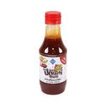 Tutiya Picante Sukiyaki and BBQ Sauce bottle in dry grocery aisle, featuring spicy, flavorful sauce for Japanese and grilled dishes.