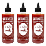 J-LEK Sriracha Chili Sauce bottle with spicy red chili sauce in 515g container, displayed in a dry grocery setting