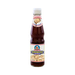 Deksomboon Oyster Sauce 350g jar, showcasing the label and product packaging, ideal for enhancing Asian dishes.