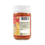 Youki Nama Momiji Oroshi spicy grated radish paste in a jar, used as a flavorful condiment in Japanese cuisine.