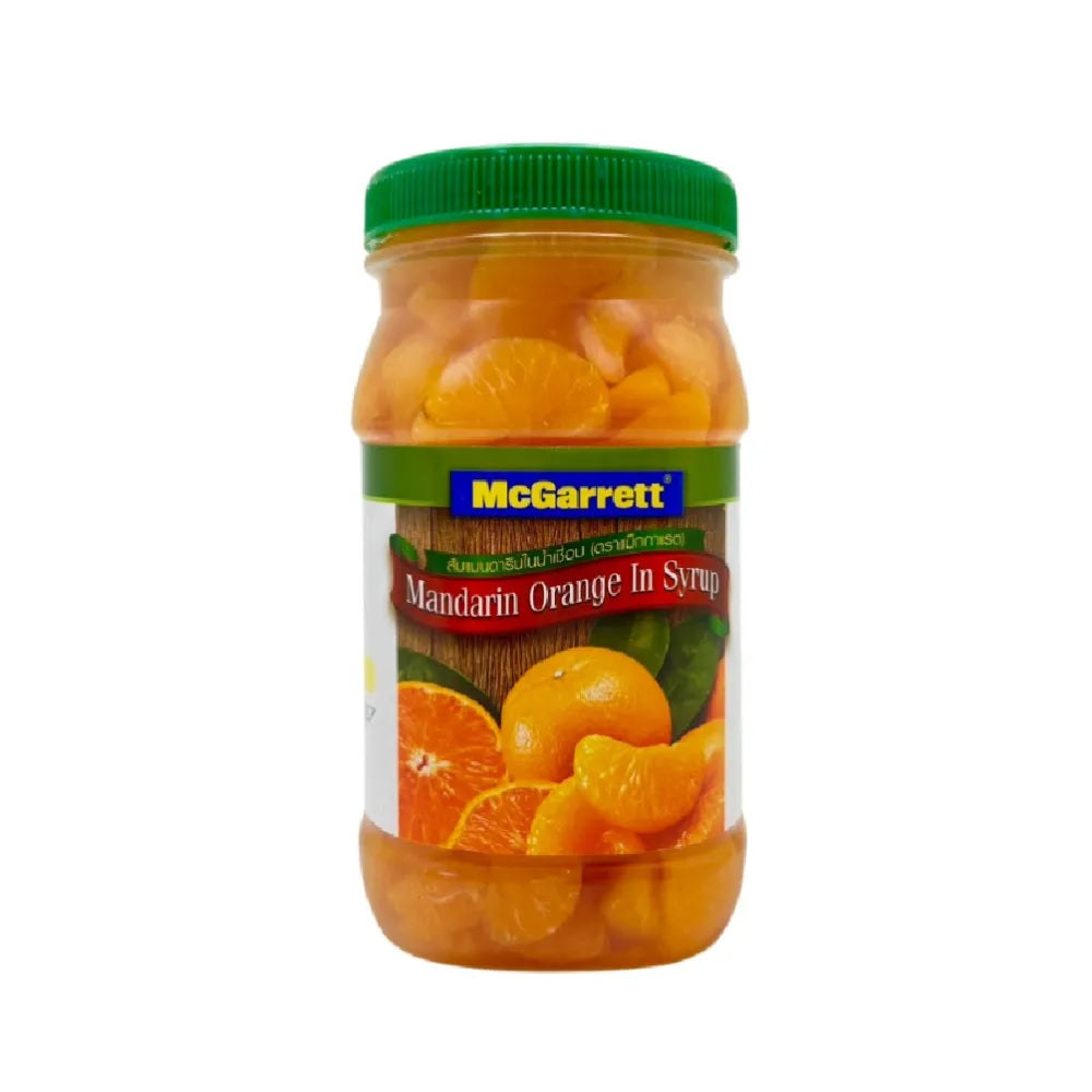 Canned Mcgarrett Mandarin Oranges in syrup, 695g, in a clear can showing bright orange fruit slices submerged in syrup.