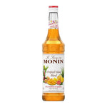 Monin Tropical Island Blend Syrup 700ml bottle, dry grocery item with colorful label, ideal for cocktails and tropical drinks