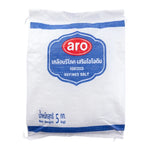 ARO Iodized Refined Salt 5kg in a clear plastic bag, showing white crystalline salt grains for culinary use.