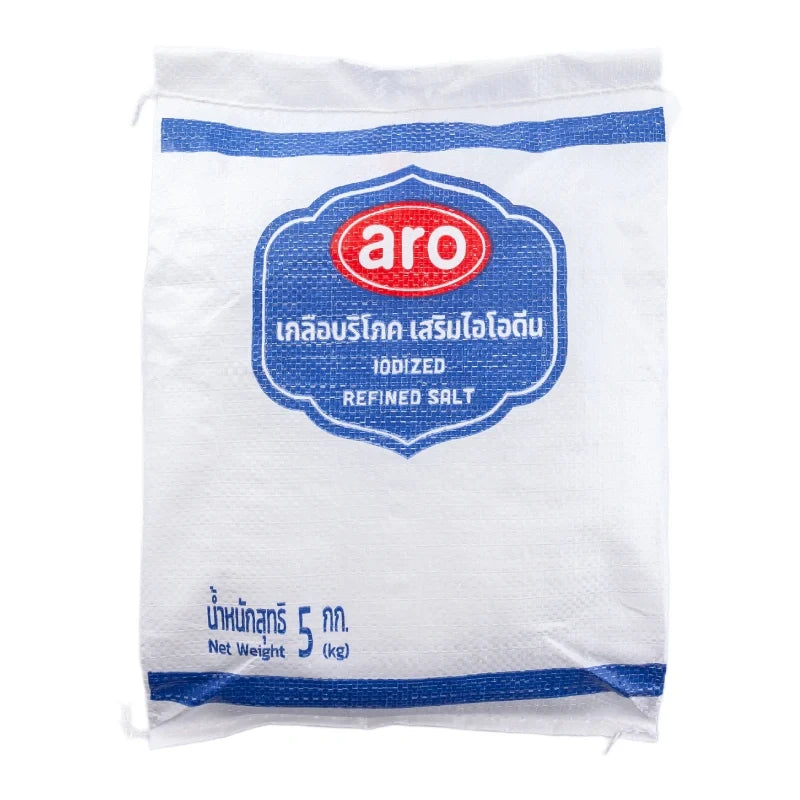 ARO Iodized Refined Salt 5kg in a clear plastic bag, showing white crystalline salt grains for culinary use.