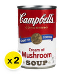 CAMPBELL'S Mushroom Cream Soup in 298g cans, stacked in a grocery setting, ready for cooking or meal preparation