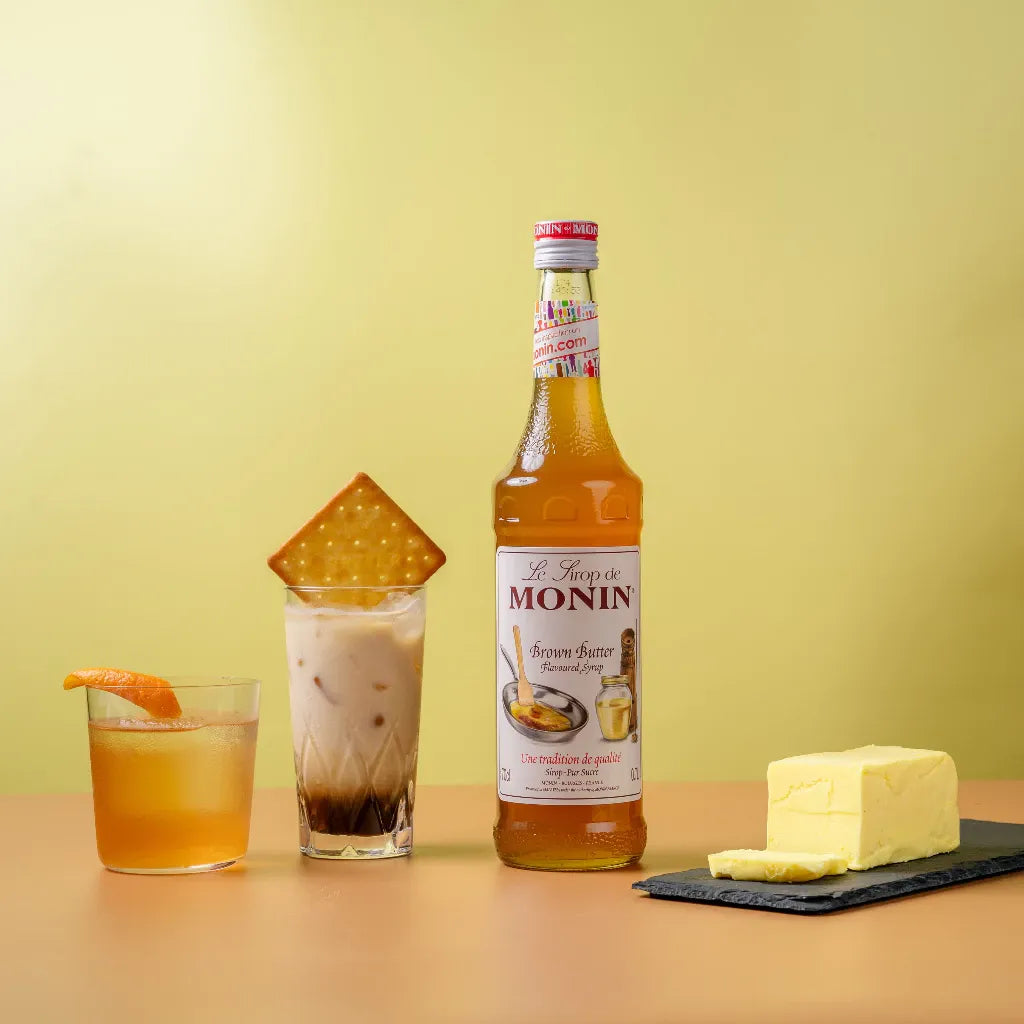 Monin Brown Butter Flavored Syrup 700ml bottle, ideal for dry grocery and flavoring beverages or desserts