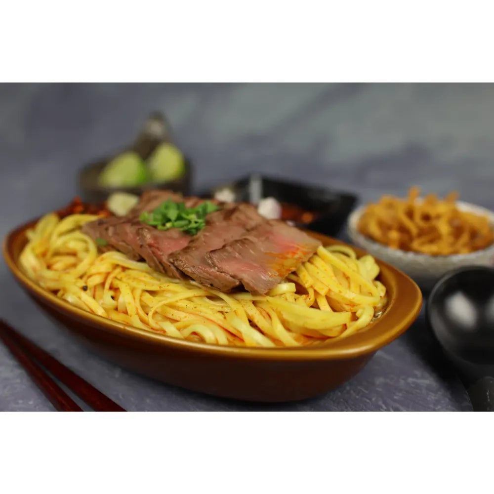 Dried Rabbit Brand Khao Soi noodles 200g package, traditional Thai-style rice noodles for cooking flavorful Khao Soi dishes