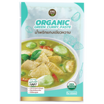 Organic Green Curry Paste by King Organic in a jar, showcasing fresh green herbs and ingredients used in Thai-style curry.