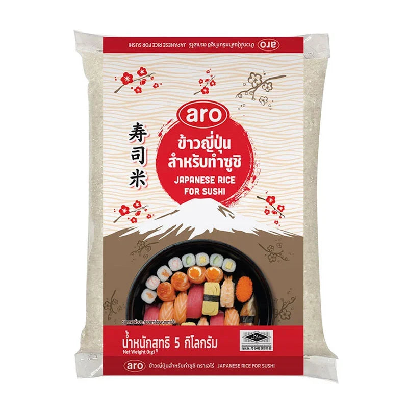 Bag of ARO Japanese rice, 5kg, dry grocery product, showing white rice grains in a clear plastic bag.