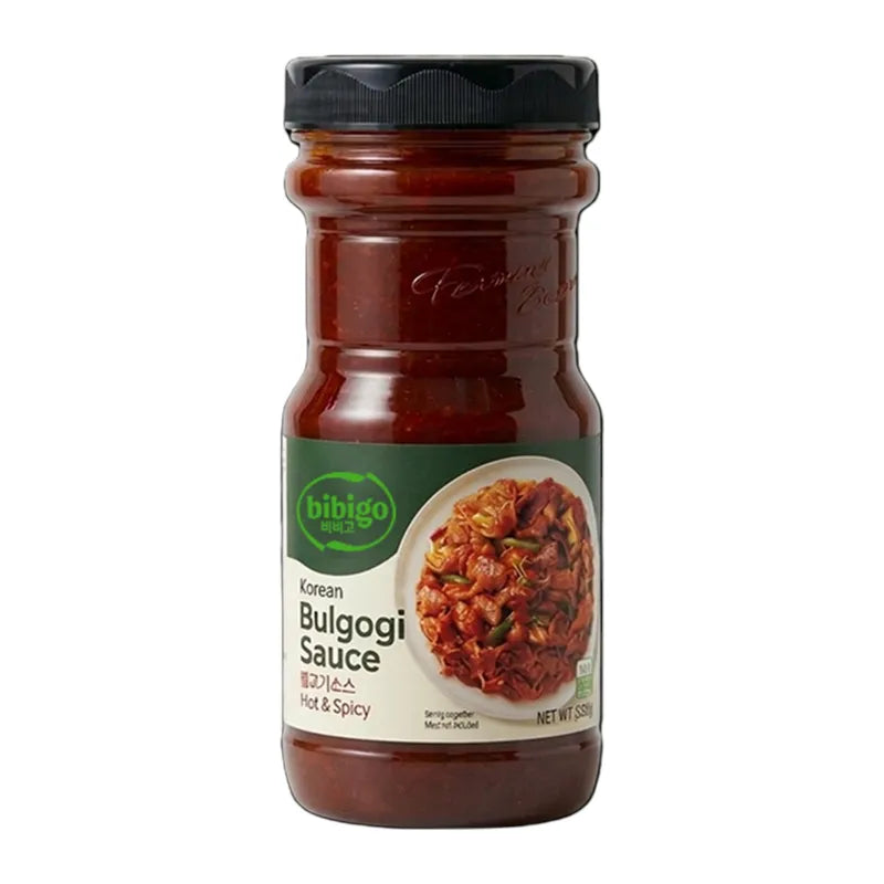BIBIGO Bibigo HOT and Spicy Bulgogi Sauce 840g jar, dry grocery product with bold red label and spicy flavor indication.