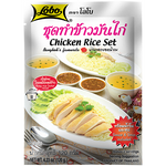 Lobo Chicken Rice Set from Lobo grocery brand, featuring cooked chicken, rice, and side dishes arranged on a plate.