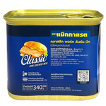 Canned McGarrett Pork Luncheon Meat sliced, ready for sandwiches or cooking, in a sealed can with label visible.